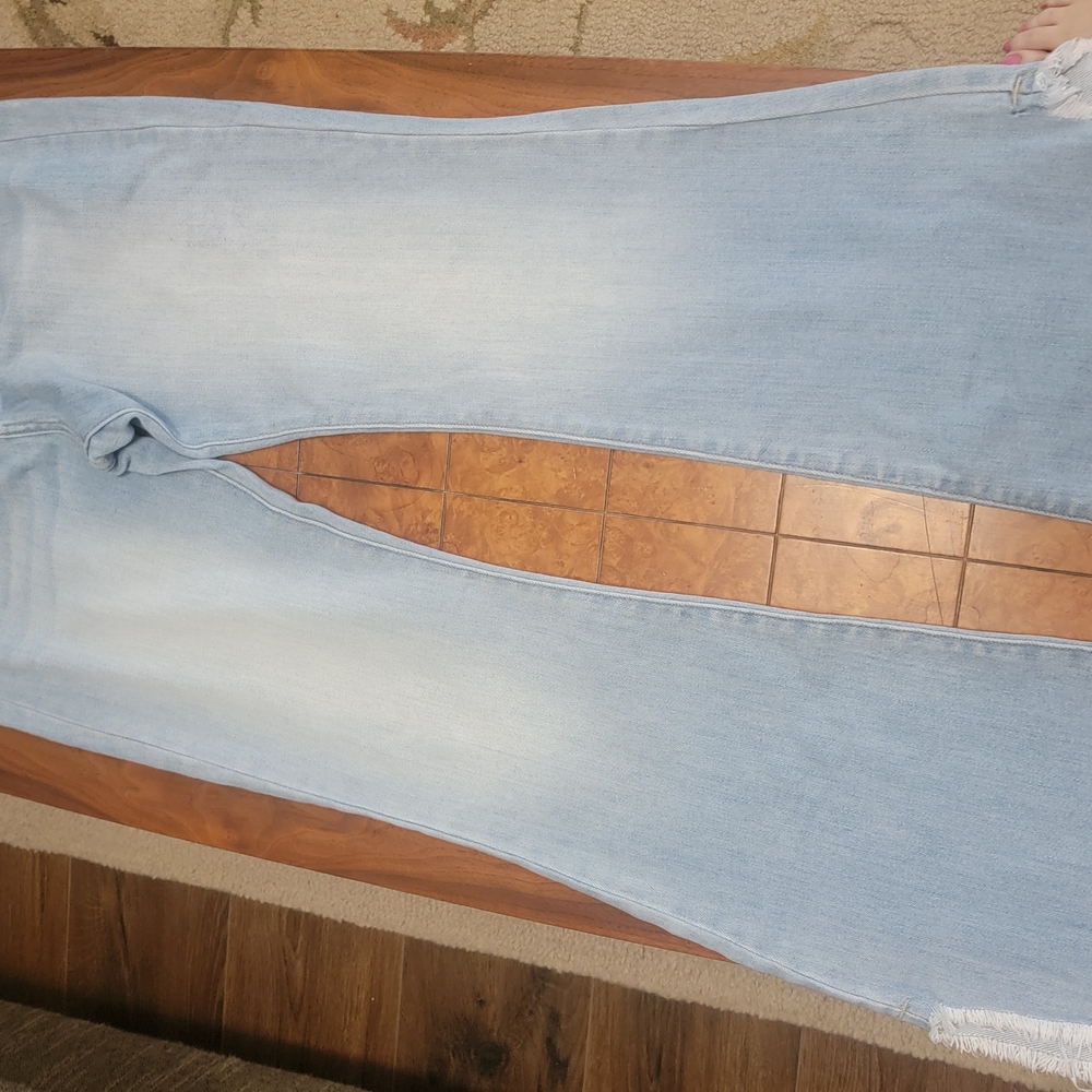 Blue Straight Leg Jeans with Distressed Details